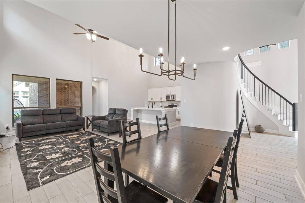 Elegant dining area with modern lighting and open flow into the living space—perfect for entertaining.