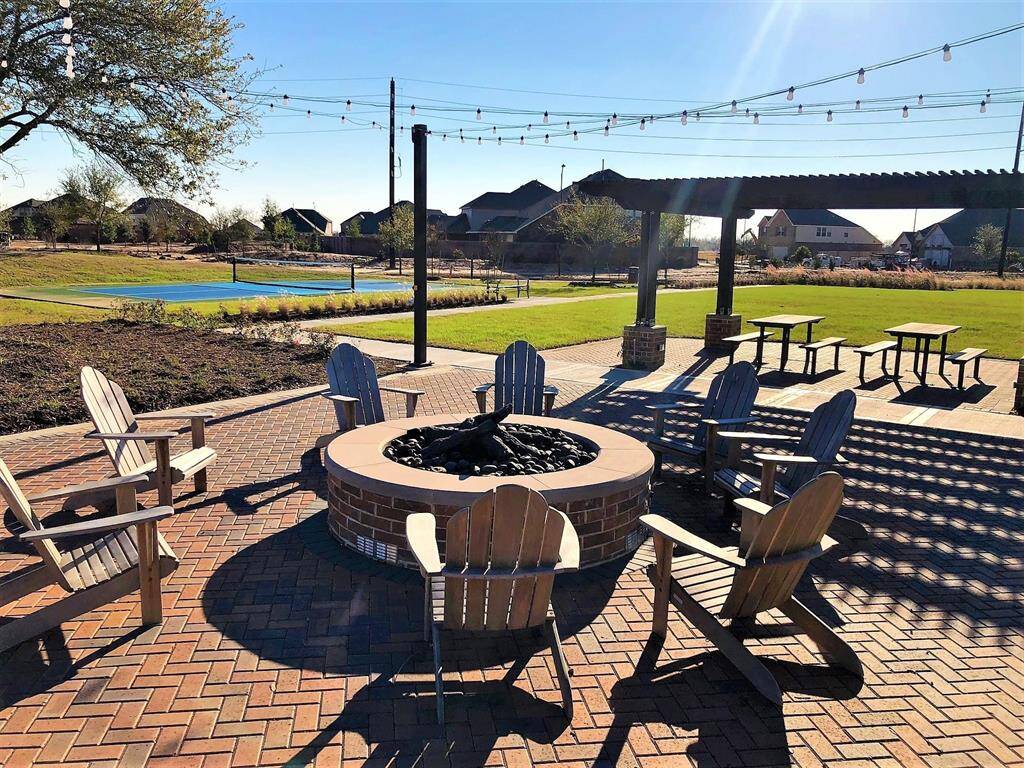 Community firepit and lounge area—perfect for gathering with neighbors.