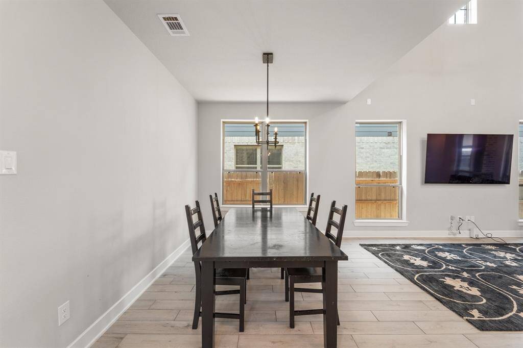 Formal dining space adjacent to kitchen and living areas—ideal for gatherings.