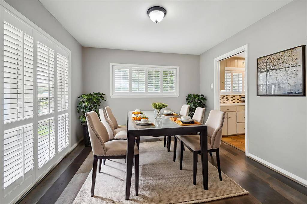 This is the formal dining room coming off of the kitchen and connected to the front foyer. The plantation shutters were added throughout.