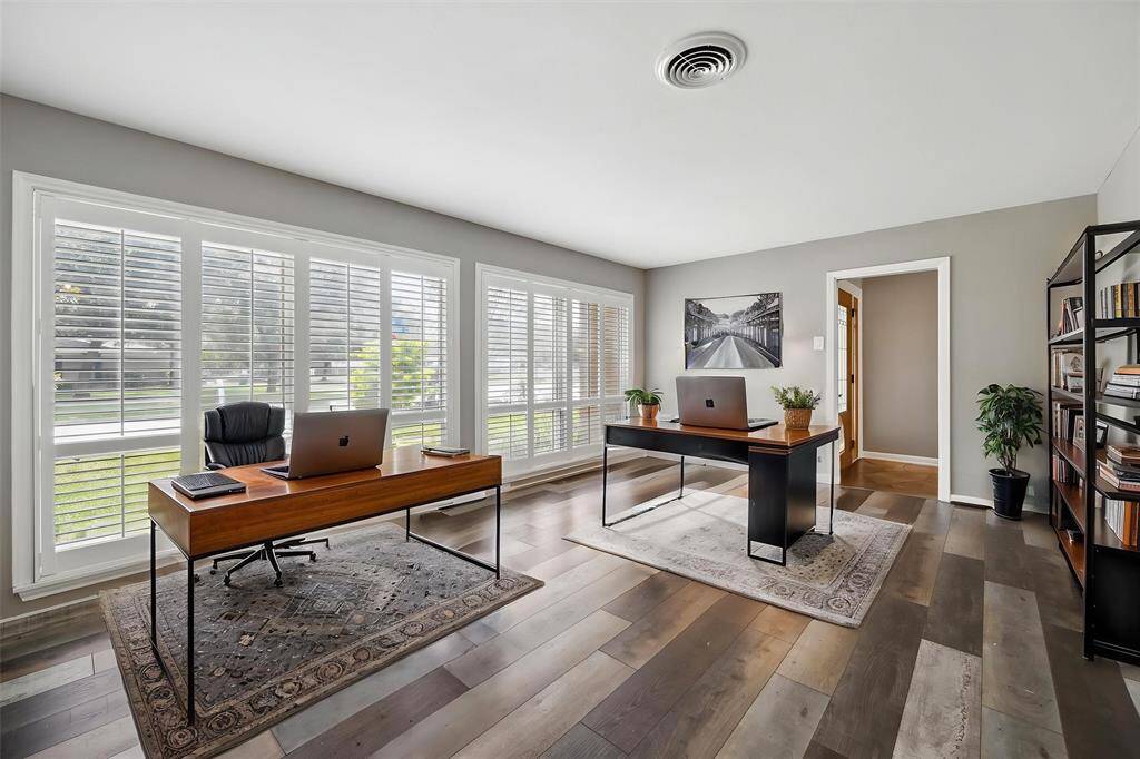 The front sitting room, if make into an office, would be big enough for two desks.