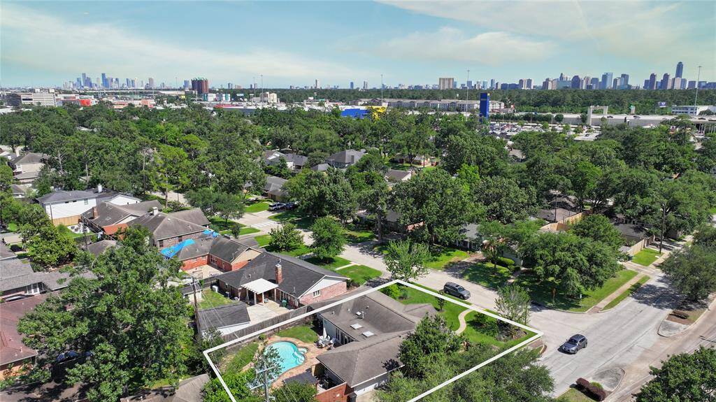 The home is white boxed in the bottom of the frame, you can see downtown (left) and the Galleria Area (right). It is living in a mature quiet neighborhood so close to everything you would want.