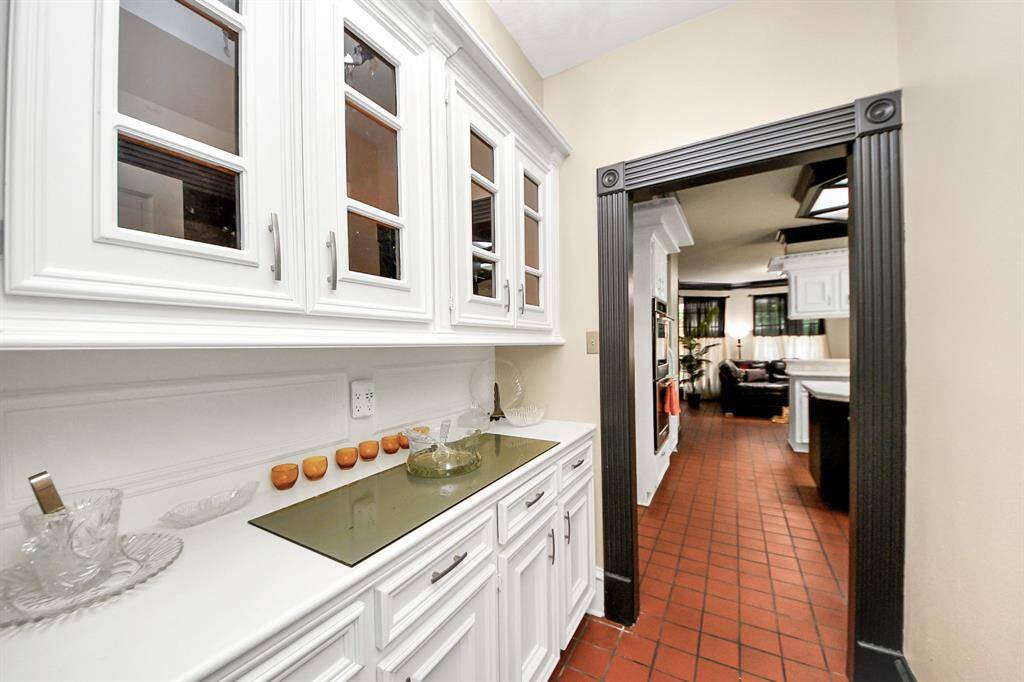 The butler’s pantry is just one of many thoughtfully designed custom cabinets in this home—offering both beauty and function throughout every space.