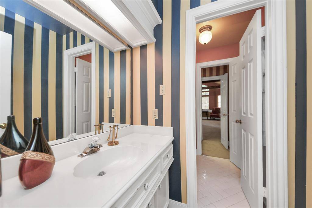 Another Jack and Jill bathroom located on the opposite side of the home, upstairs.