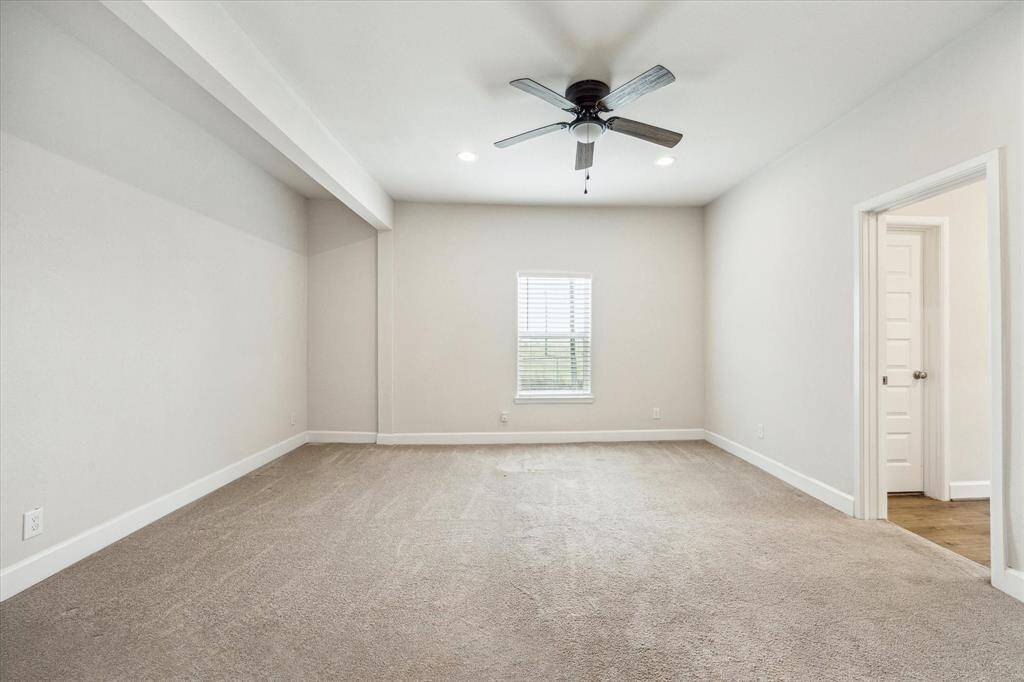 Convenient half bath tucked under the stairs—perfect for guests.