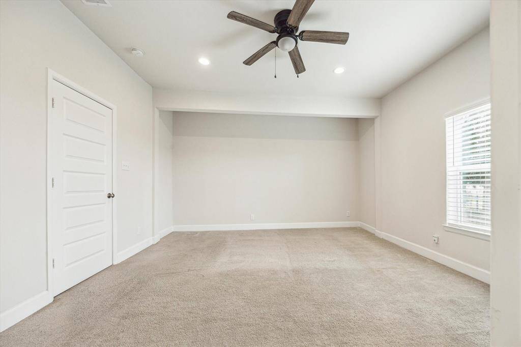 Primary is a generous layout with room for a king bed and more.