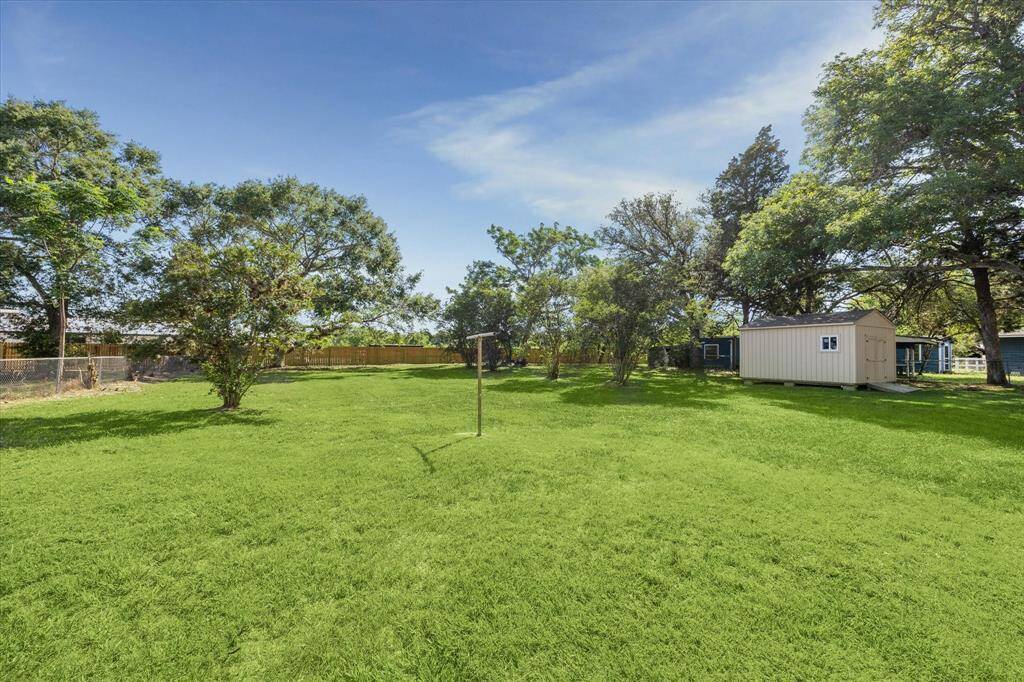 Big yard, big potential—perfect for family fun, gardening, or future additions.