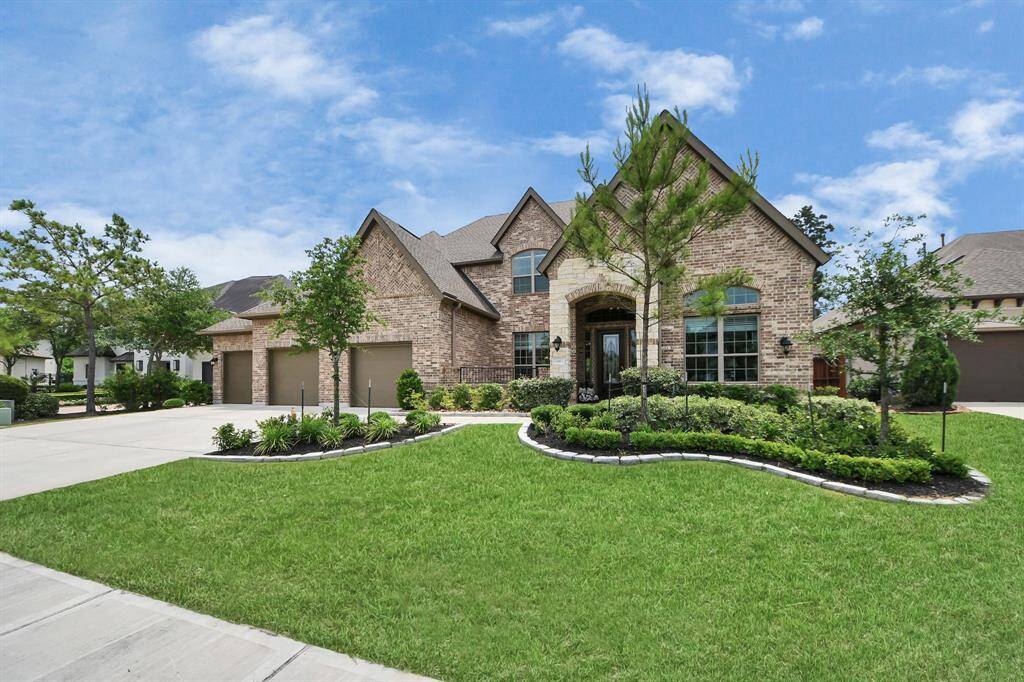 Welcome to 8546 Tombron Grove, located in Northgrove subdivision. House has 4 bedrooms, 4 full baths, one 1/2 bath and 4 car garage