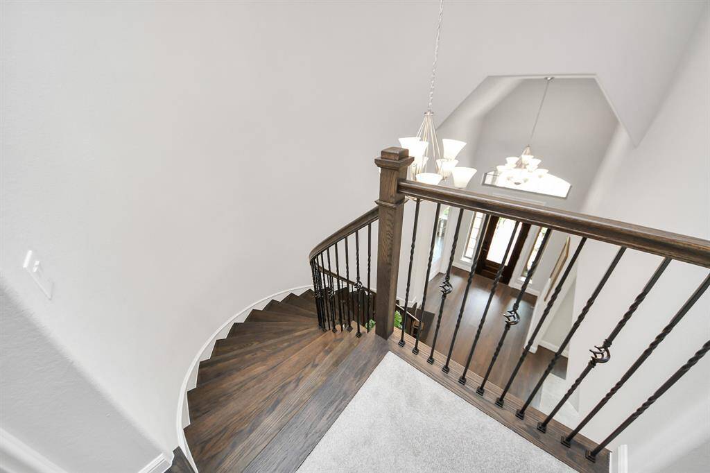 This elegant winding staircase adds a touch of sophistication to your home.
