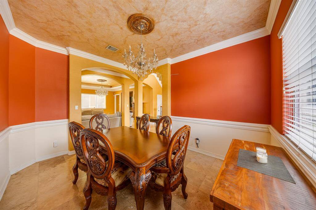 Warm light filters into the dining room, creating a cozy, inviting atmosphere perfect for every meal.