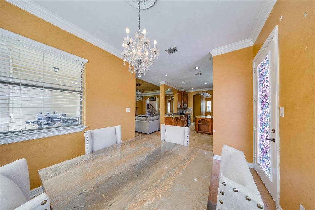 Breakfast room located across from the kitchen for easy access, ideal for casual meals and morning routines.