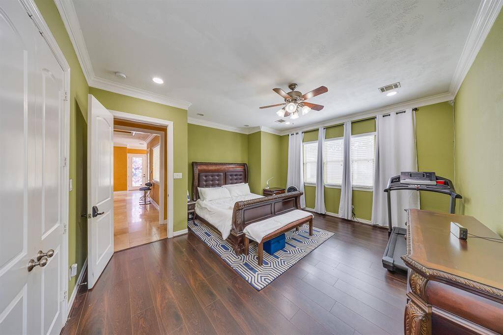 Primary bedroom on the first floor, offering added privacy and convenience for a restful and peaceful retreat.