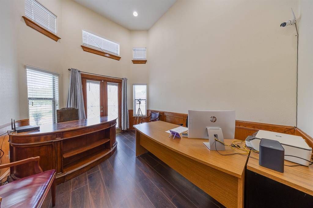 Home office with plenty of natural light, creating a productive and comfortable space for work or study.