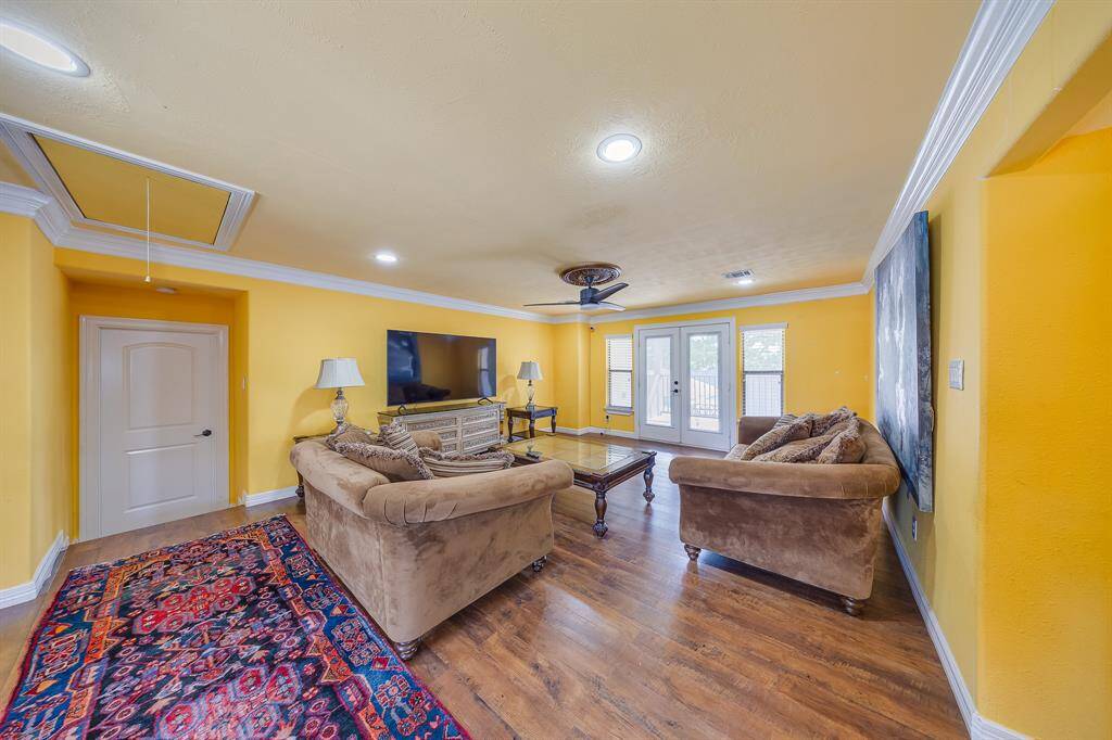 Spacious game room upstairs, perfect for entertainment, family fun, or creating a personalized recreational space.