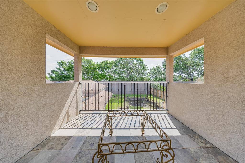 Charming balcony at the back upstairs, offering scenic views and a perfect spot to relax and unwind.
