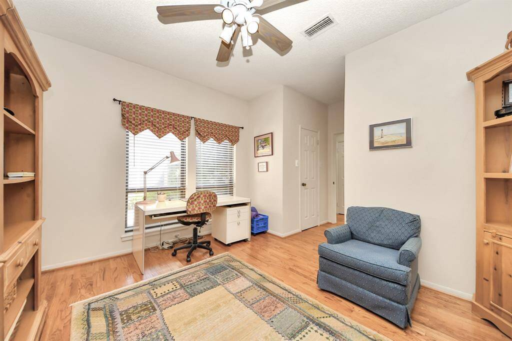 This incredible floor plan features two bedrooms and two full baths downstairs, making this, the fourth bedroom, a convenient  flex space that works well for guests, in-laws, nanny or even office. Wonderful walk in closet with great storage here!