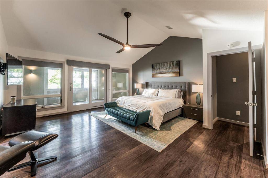 Tucked away on its own floor for ultimate privacy, the primary suite feels like a boutique escape with Kardean floors, vaulted ceilings and your own screened in patio. Wake up and wind down to the sound of the lake waves and awesome views right outside your bedroom window!