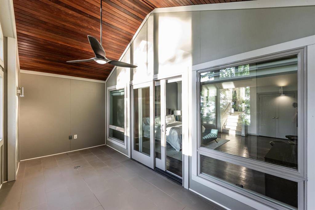 Step straight from the primary suite onto your private screened-in patio—made for morning coffee and quiet escapes. Enjoy all the lake views from the quiet comfort of your screened in patio!