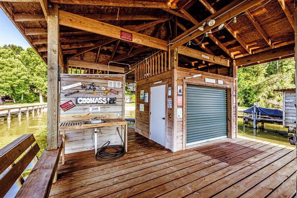 A lakeside essential—complete with roll-up storage, prep space, and elevated detailing throughout.