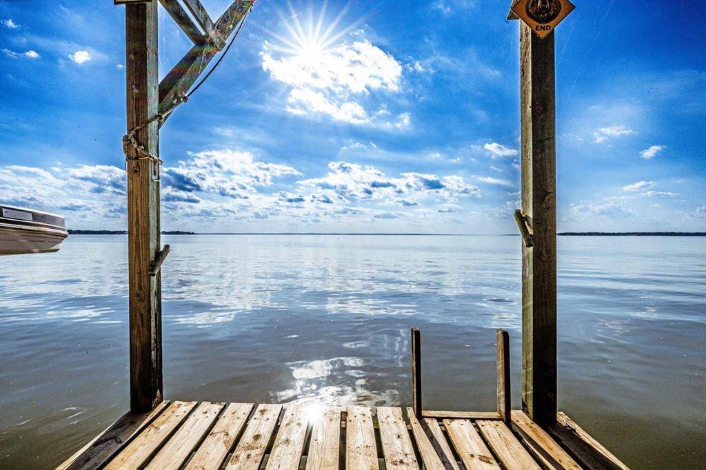 Step onto the dock and into tranquility—calm waters, endless sky.  This is Lake Livingston living at its most breathtaking.