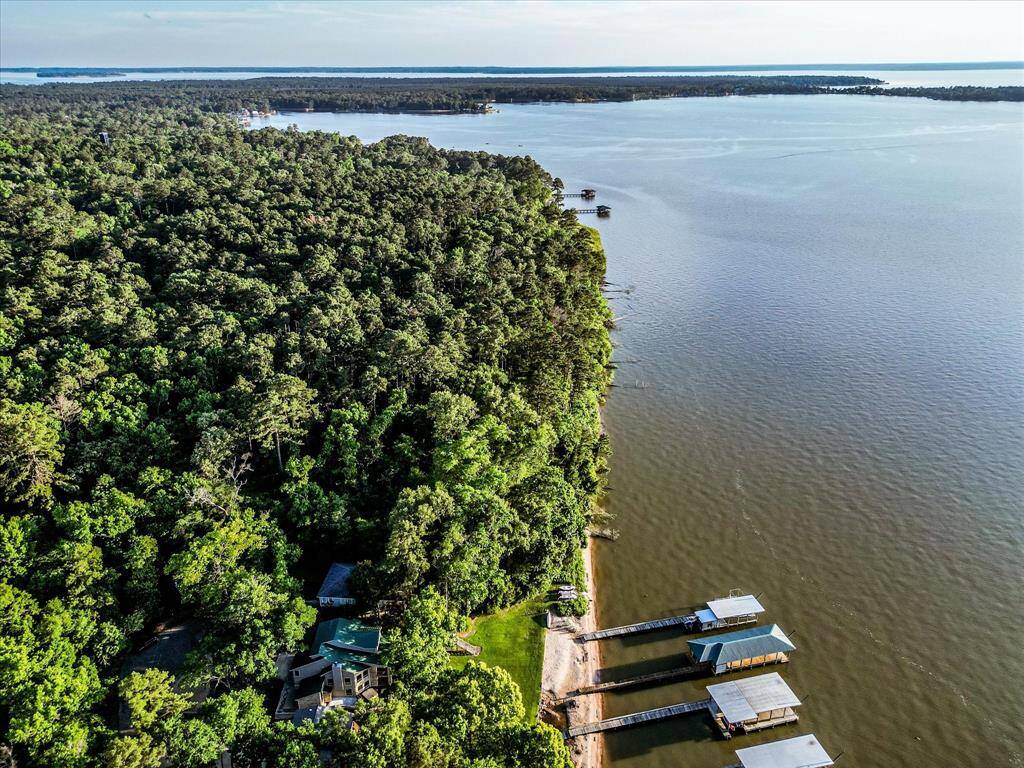 Bordering 70 acres of untouched forest, this lakeside estate is truly one of a kind!