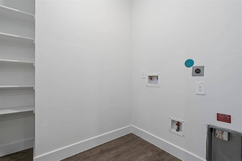 Utility room right off of kitchen.  Washer/dryer will be included!