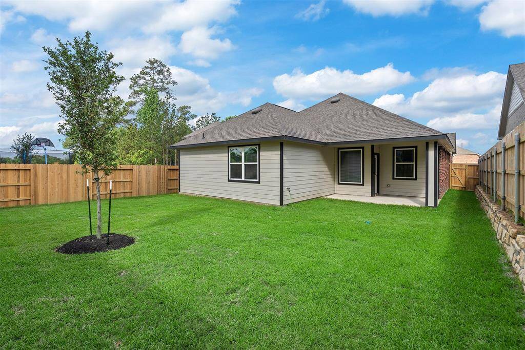 View of large backyard which is fenced!