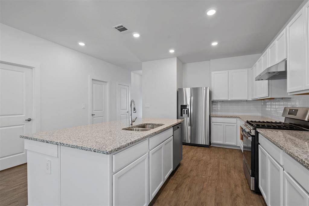Stainless steel fridge included!