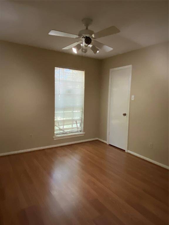 Front bedroom ceiling fan, walk in closet, liminate flooring