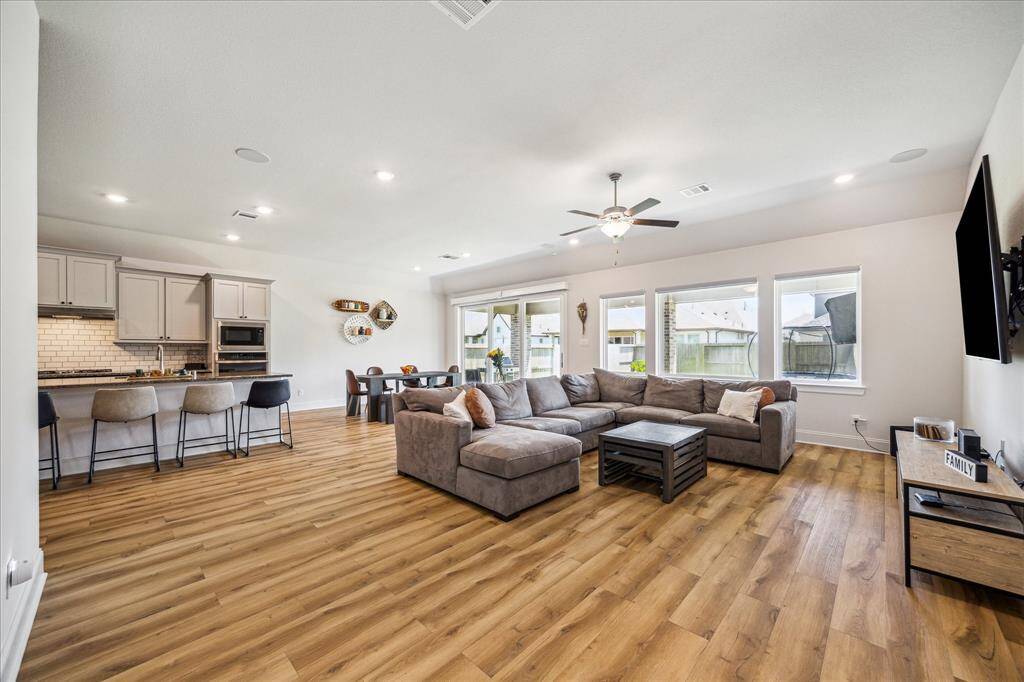 Single owners for less than 3 years, they selected many of the key upgrades from Shea Homes including the stacked slider and extended patio to the upgraded flooring, storage options and added half bath.
