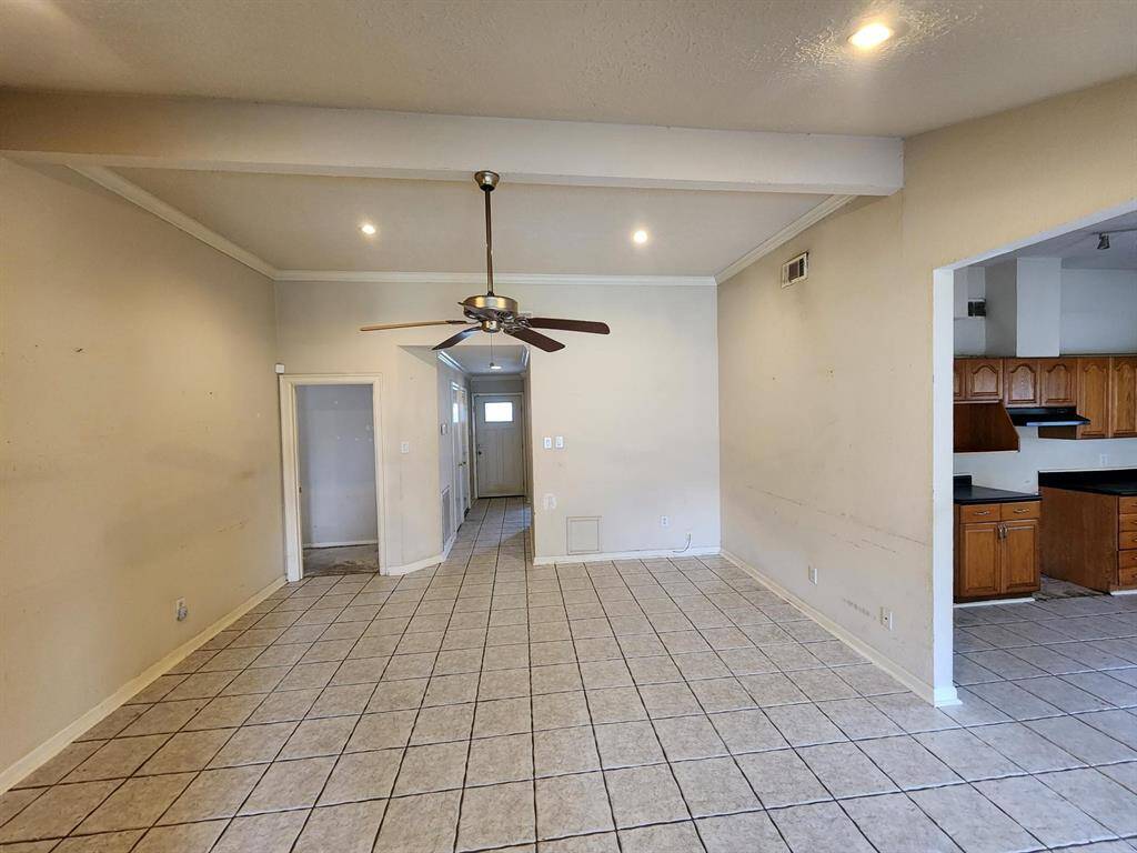 Family Room with Vaulted Ceiling and Recessed Lighting.