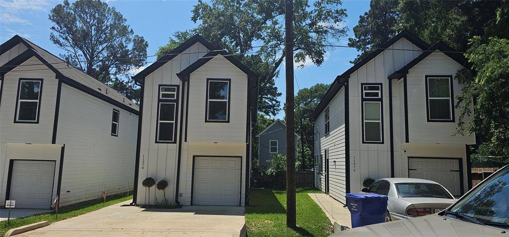 Welcome to 11378 Underwood St.. Your new home! The two-story homes with black trim and white concrete siding feature single-car garages and double-wide driveways. I just can't wait till you see the interior.