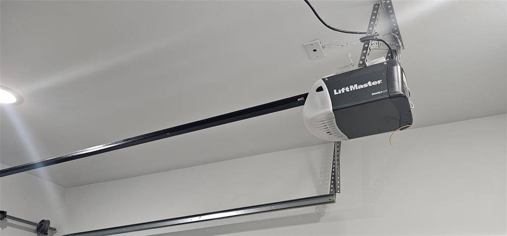 The one-car garage is equipped with a garage door opener.