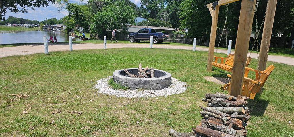 Can you imagine relaxing in the swing at sunset overlooking the lake enjoying some roasted marshmallows?