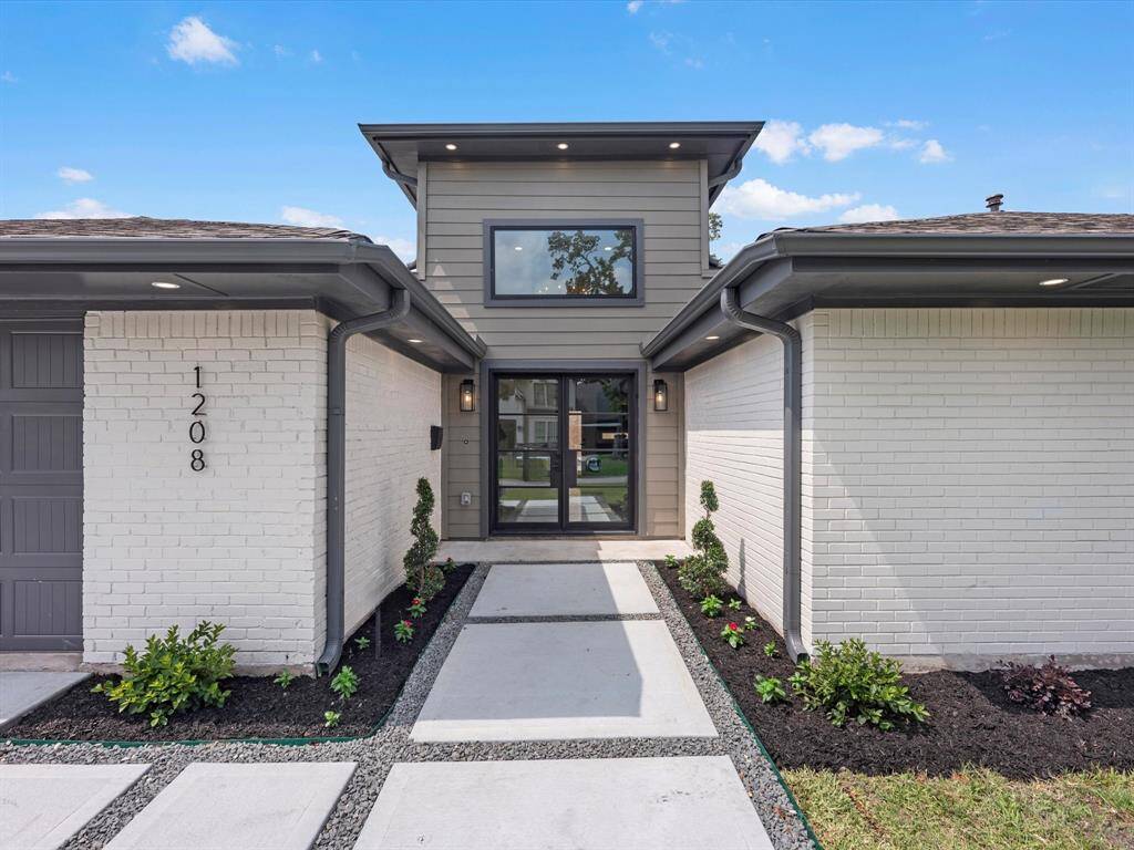 Grand Entry with Double Iron/Glass Front Door