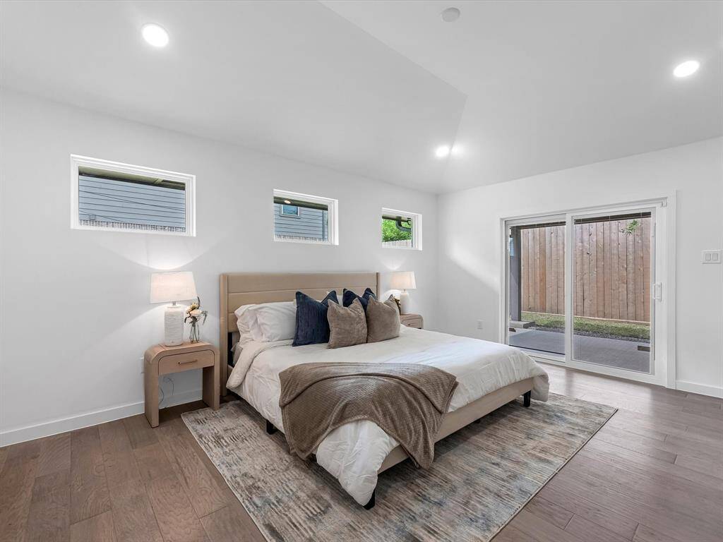 Primary Bedroom with sliding door access to the covered patio.