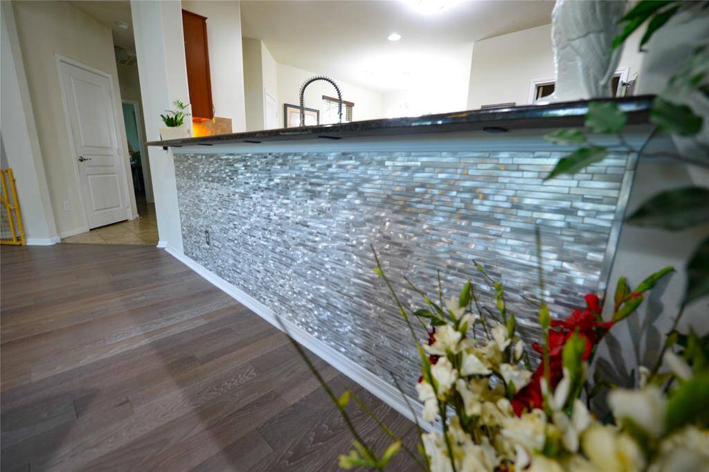 Custom glass tile trim on the bar.