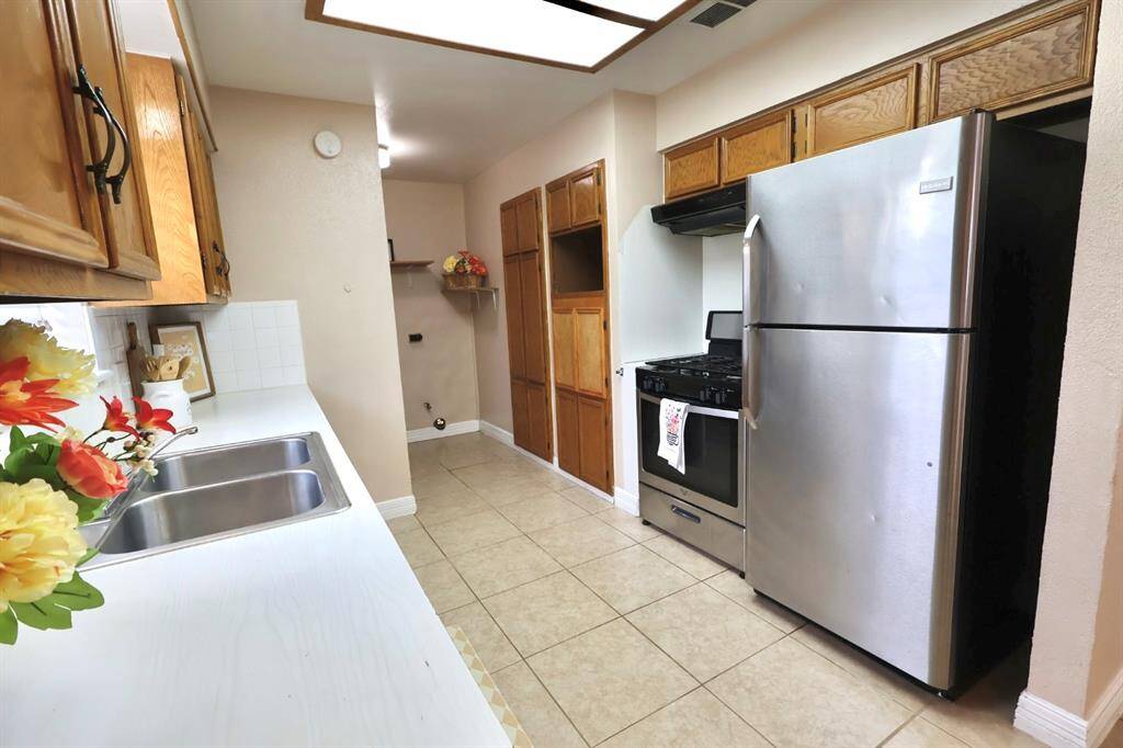 Kitchen equipped with sleek stainless steel appliances