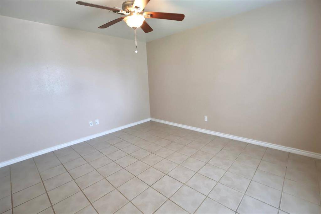 This room can easily double as a fourth bedroom, offering versatile space that adapts to your lifestyle