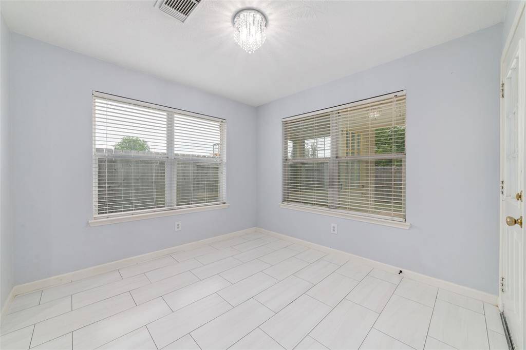 Eat in kitchen with access to sunroom and covered patio