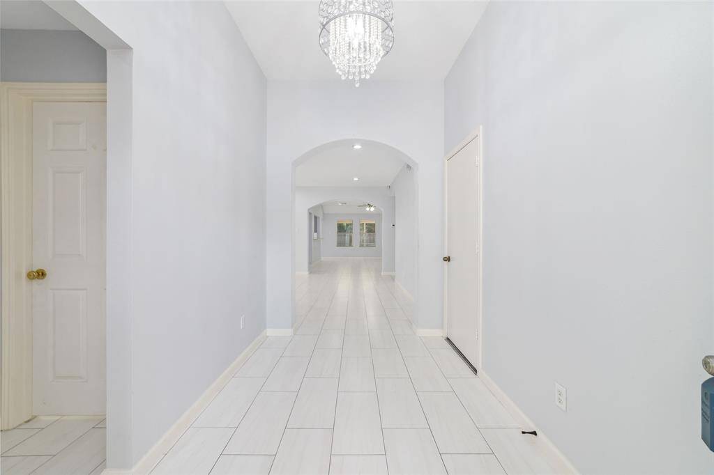 Updated entry foyer with garage access