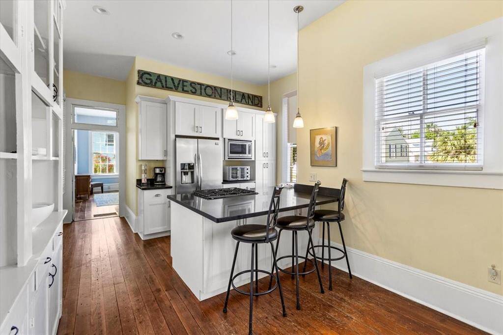 Dining room open to kitchen with bar seating