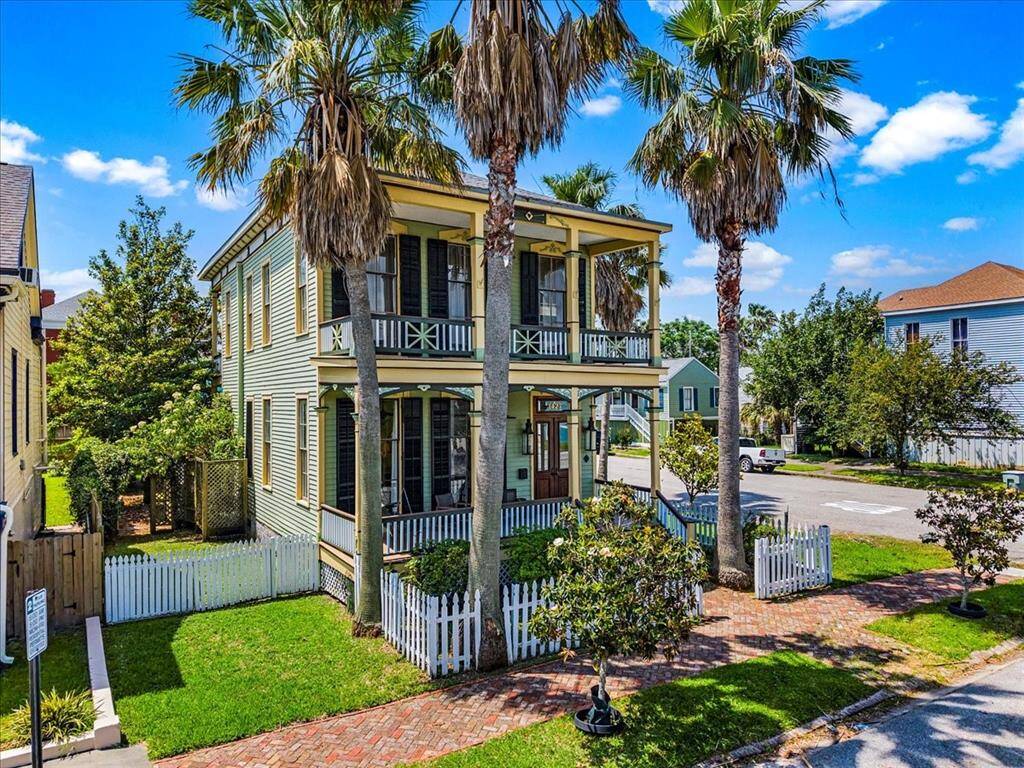 Large corner lot with lush landscaping and beautiful magnolia trees