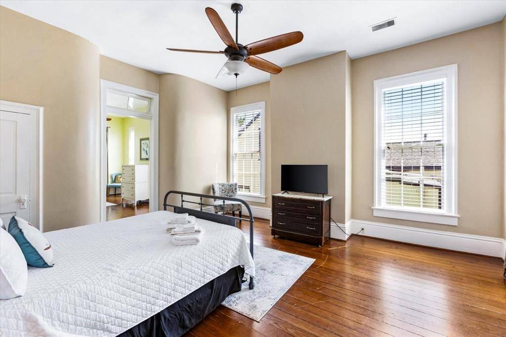 Bedroom 4 is upstairs. This room is oversized and overlooks the side and back yards.