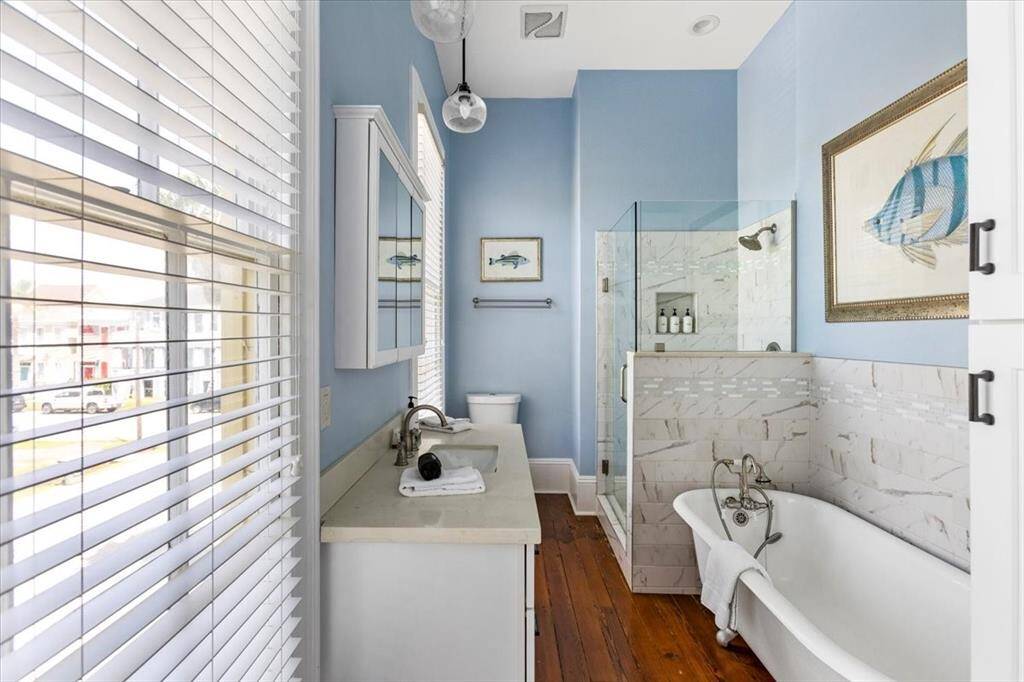 En suite located at the rear of the home in 2nd Primary bedroom. Check out that clawfoot tub!