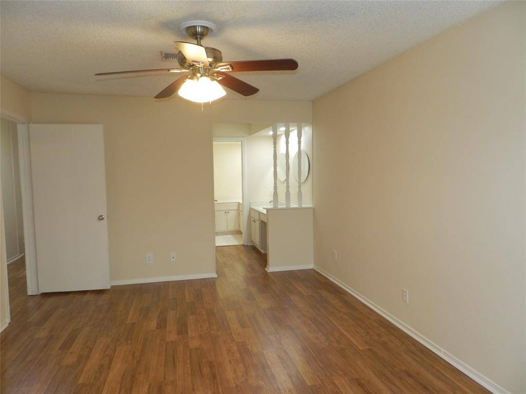 another view of primary bedroom
