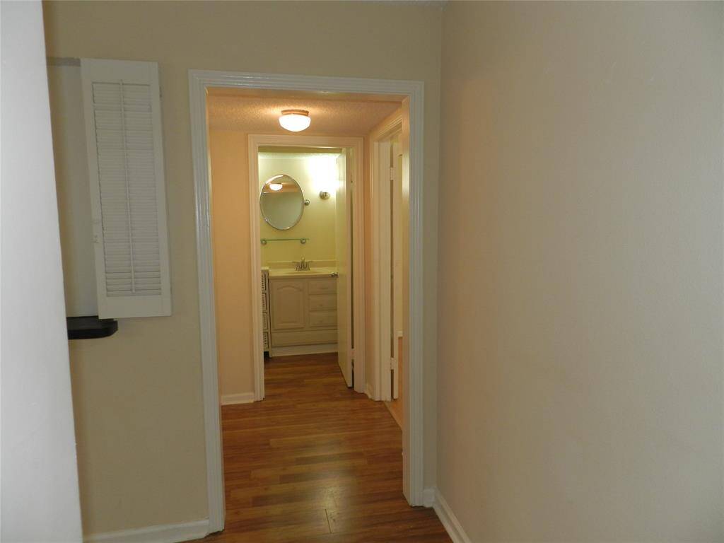 to the right of front hall looking at first floor full bath and bedroom to the right