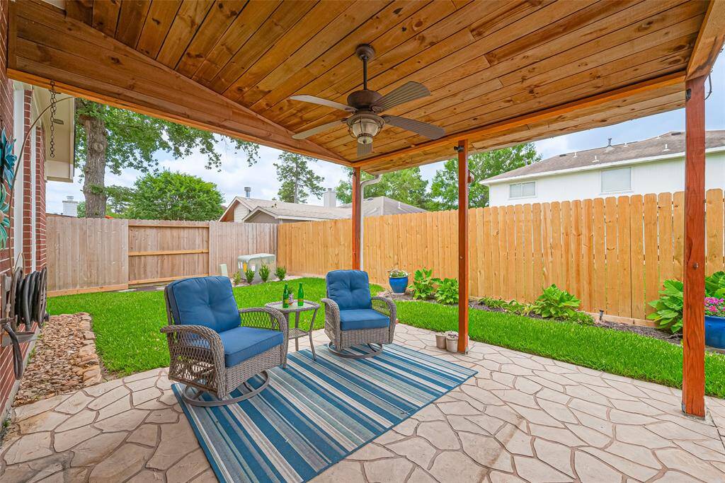 Charming covered patio with elevated views, perfect for relaxing and entertaining.