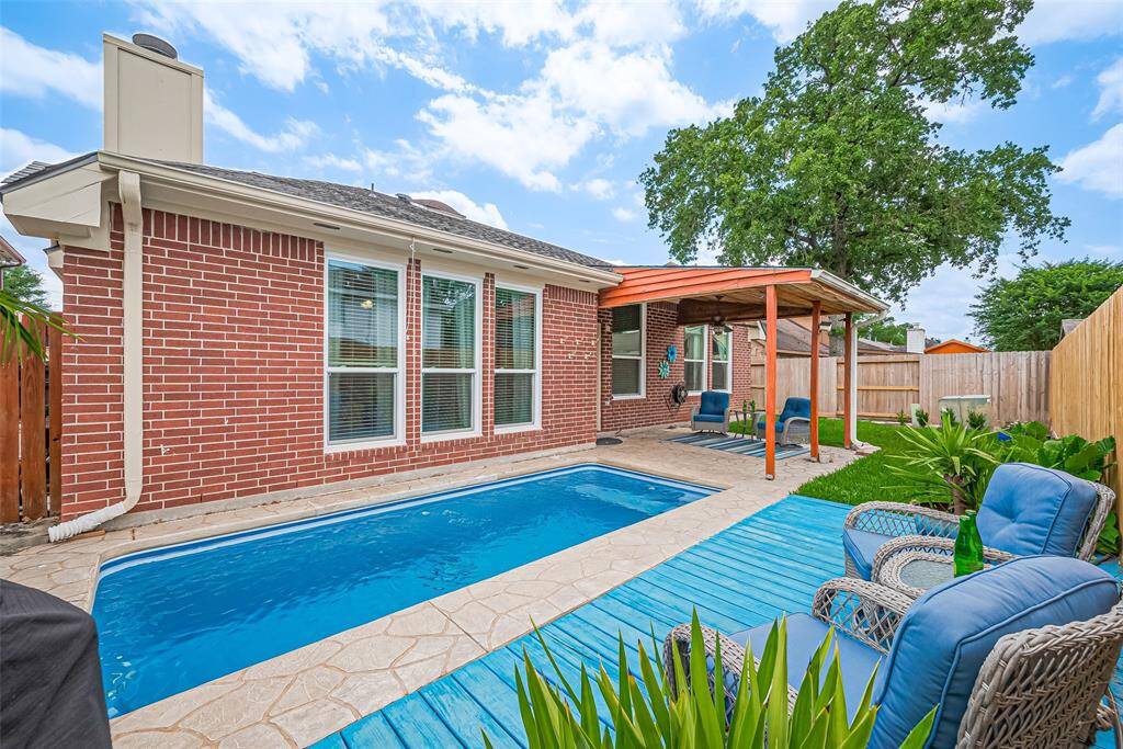 Seize the chance to own this stunning home with a charming poolside retreat.