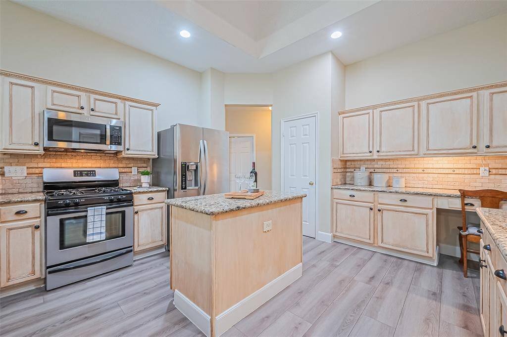 Brighten your days in the main living area with newly replaced, expansive windows that fill the space with natural light.